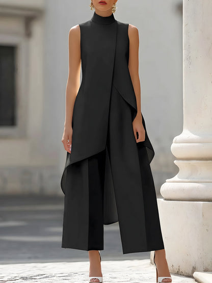 Combinazione donna elegante con colletto alto e taglio asimmetrico