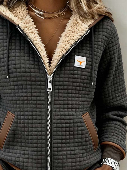 Camilla™ | Giacca con cappuccio imbottita foderata in sherpa